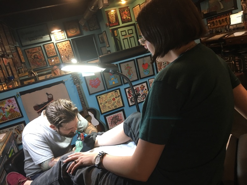 Megan Volpert at Only You Tattoo as Charles Chatov goes to work, photo by Mindy Friedman